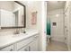 Bright bathroom with white subway tile, modern fixtures, and a shower-tub combo for comfortable living at 2716 Willow Rock Ln, Apex, NC 27523