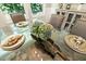 Close up of an elegantly decorated dining table with exquisite dishware and a beautiful floral centerpiece at 2716 Willow Rock Ln, Apex, NC 27523
