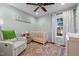 Cute Bedroom with crib, rocker, and plenty of natural light at 2856 Gwyn Rd, Elon, NC 27244