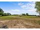 Open field that is very large with a white house in the background at 2856 Gwyn Rd, Elon, NC 27244