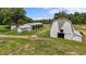 Photo of barns and outbuildings in a grassy field on a farm at 2856 Gwyn Rd, Elon, NC 27244