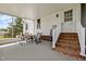 Covered patio with seating area at 2856 Gwyn Rd, Elon, NC 27244