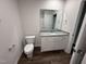 Bathroom featuring granite countertop and toilet at 295 Eason Creek Way, Clayton, NC 27527
