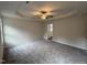 Spacious main bedroom features neutral walls and plush carpeting at 295 Eason Creek Way, Clayton, NC 27527
