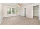 Spacious bedroom with neutral walls, carpeted floor and walk-in closet at 3036 Landing Falls Ln, Raleigh, NC 27616