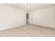 Bedroom featuring neutral walls and carpet with a bright window view at 3036 Landing Falls Ln, Raleigh, NC 27616