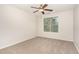 Bedroom featuring neutral walls and carpet with a bright window view and ceiling fan at 3036 Landing Falls Ln, Raleigh, NC 27616