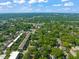 Aerial view of the neighborhood featuring green tree canopies and charming homes at 304 Polk St, Raleigh, NC 27604