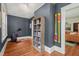Cozy room features hardwood floors, a bookshelf, and red exercise bike at 304 Polk St, Raleigh, NC 27604