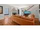 Bright living room featuring hardwood floors, fireplace, and modern staircase at 304 Polk St, Raleigh, NC 27604