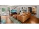 Bright living room with hardwood floors, staircase, and cozy seating area at 304 Polk St, Raleigh, NC 27604