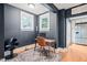 Office space featuring wood floors, natural light, and access to the kitchen at 304 Polk St, Raleigh, NC 27604