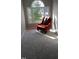 Bright bedroom with plush carpet and a large arched window providing natural light at 3109 Benton Cir, Raleigh, NC 27615