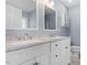 Bathroom features a double vanity with granite counters and white cabinets at 3147 Rapid Falls Rd, Cary, NC 27519