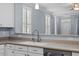Kitchen boasts stainless steel appliances and a double sink at 3147 Rapid Falls Rd, Cary, NC 27519