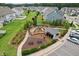 Aerial view of the playground within the community with lots of space to play and picnic tables at 3194 Retama Run, New Hill, NC 27562