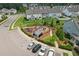 Aerial view of community playground with covered picnic tables and ample parking at 3194 Retama Run, New Hill, NC 27562