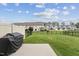 This backyard features a grill, privacy fence and plenty of space to entertain at 3194 Retama Run, New Hill, NC 27562
