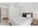 This bedroom features neutral colors and a ceiling fan for added comfort at 3194 Retama Run, New Hill, NC 27562