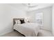 Bedroom with bed, ceiling fan, neutral carpet and a window at 3194 Retama Run, New Hill, NC 27562