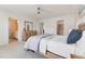 Bright bedroom with wood furniture and an ensuite bathroom at 3194 Retama Run, New Hill, NC 27562