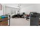 Large office area with carpet, ceiling fan and large windows at 3194 Retama Run, New Hill, NC 27562
