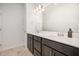Bright bathroom with double sinks and modern lighting at 321 Conrad Ln, Wake Forest, NC 27587