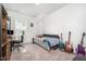 Relaxing bedroom with a workspace and guitars at 321 Conrad Ln, Wake Forest, NC 27587