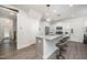 Modern kitchen with granite countertops, stainless steel appliances, and stylish island seating at 321 Conrad Ln, Wake Forest, NC 27587