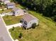 An aerial view of a two-story home showcasing the community and landscaping at 3292 Longpine Rd, Burlington, NC 27215