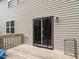 Back deck featuring wooden flooring and view of the backyard at 3292 Longpine Rd, Burlington, NC 27215