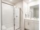 Bathroom featuring a white vanity with a glass shower door and modern fixtures at 3292 Longpine Rd, Burlington, NC 27215