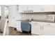 Kitchen desk area with granite countertops and a comfortable blue desk chair at 3292 Longpine Rd, Burlington, NC 27215