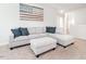 Cozy living room with a comfortable sofa and an American flag wall decoration at 3292 Longpine Rd, Burlington, NC 27215
