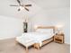 Spacious primary bedroom boasts vaulted ceiling, ceiling fan, and ensuite access at 3292 Longpine Rd, Burlington, NC 27215