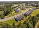 A beautiful community with a pond, surrounded by lush greenery at 3417 Cardinal Lake Dr, Durham, NC 27704