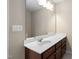 Spacious bathroom with a large mirror, vanity, and sink, offering functionality at 3417 Cardinal Lake Dr, Durham, NC 27704