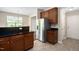 Updated kitchen with a stainless steel refrigerator, granite countertops, and stylish wood cabinetry at 3417 Cardinal Lake Dr, Durham, NC 27704