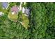 Aerial view showing the property's backyard, mature trees, and neighborhood surroundings at 3748 Westbury Lake Dr, Raleigh, NC 27603