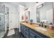 Bathroom showcasing double sinks, granite countertops, and modern fixtures at 3748 Westbury Lake Dr, Raleigh, NC 27603
