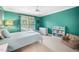 Cozy bedroom with a ceiling fan, bright walls, and comfortable furniture at 3748 Westbury Lake Dr, Raleigh, NC 27603