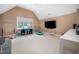 Large, versatile bonus room with vaulted ceilings and ample play space at 3748 Westbury Lake Dr, Raleigh, NC 27603