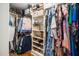 Walk-in closet with custom shelving and ample storage space for clothing and accessories at 3748 Westbury Lake Dr, Raleigh, NC 27603