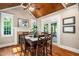 Vaulted ceiling and fireplace complement the hardwood floors and natural light in this dining room at 3748 Westbury Lake Dr, Raleigh, NC 27603
