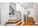 Hallway with hardwood floors that leads to a bonus room at 3748 Westbury Lake Dr, Raleigh, NC 27603