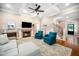 Living room features a fireplace, coffered ceilings, and hardwood floors at 3748 Westbury Lake Dr, Raleigh, NC 27603