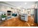 Open-concept layout features a living room and kitchen at 3748 Westbury Lake Dr, Raleigh, NC 27603