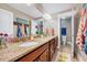 Bathroom with granite countertop, double vanity, and tile floors at 39 Westover Ct, Sanford, NC 27332