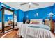 Stylish bedroom with hardwood floors, a large mirror, and unique decorative touches at 39 Westover Ct, Sanford, NC 27332