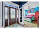 A peek into a cheerfully decorated bedroom with a decorative glass door at 39 Westover Ct, Sanford, NC 27332